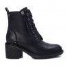 Botines tacón Xti negros con cremallera lateral y suela dentada