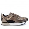Sabatilles esportives Xti de color bronze amb estampat animal print