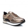 Sabatilles esportives Xti de color bronze amb estampat animal print
