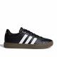 Sabatilles esportives Adidas negres amb bandes blanques sola de goma marró - Querol online