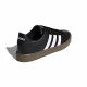 Sabatilles esportives Adidas negres amb bandes blanques sola de goma marró - Querol online