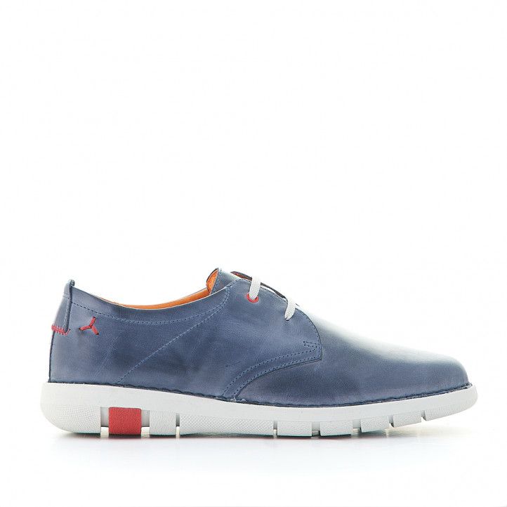 Zapatos sport Zen azules con detalles rojos y suela blanca