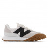 Sabatilles esportives New Balance XC-72 blanques amb negre