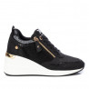 Zapatillas cuña Xti negras con cremallera lateral y apliques dorados