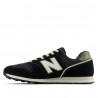 Zapatillas New Balance 373 negras con detalles verdes