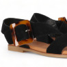 Sandàlies planes Chika 10 negres amb tires creuades a la pala i sivella carei