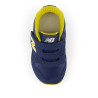 Sabatilles esport New Balance 373 hook & loop blaves amb detalls grocs