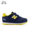 Sabatilles esport New Balance 373 hook & loop blaves amb detalls grocs