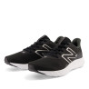 Zapatillas deportivas New Balance 411v3 negras con la suela blanca