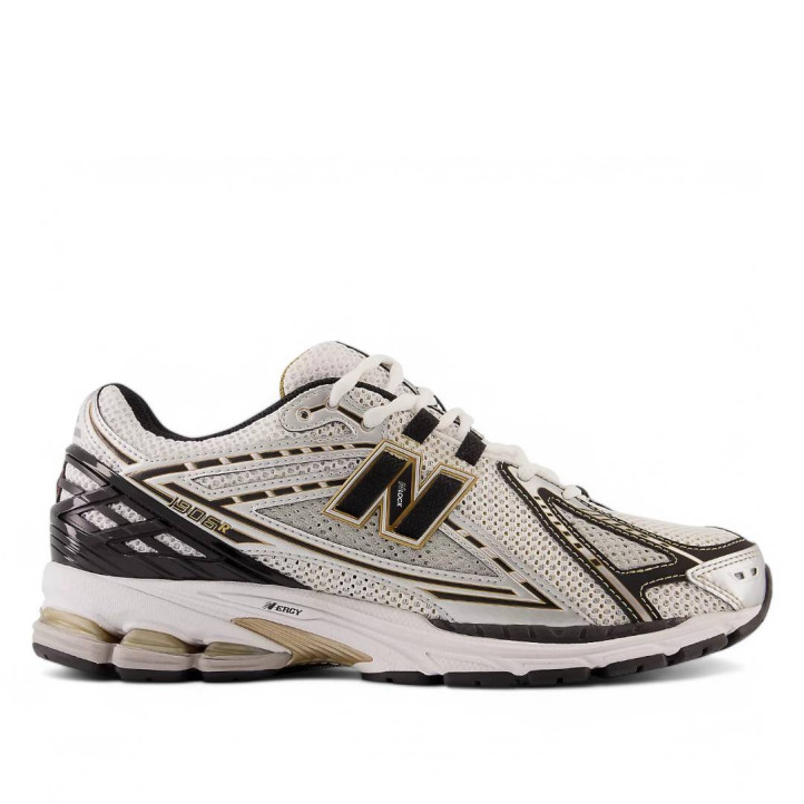 Sabatilles esportives New Balance 1906R metallic silver amb metallic gold per a home - Querol online