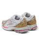 Sabatilles esportives New Balance 1906R silver dragon amb berry gold per a dona - Querol online