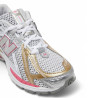 Sabatilles esportives New Balance 1906R silver dragon amb berry gold per a dona