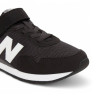 Sabatilles esport New Balance 323 black and white per a nen