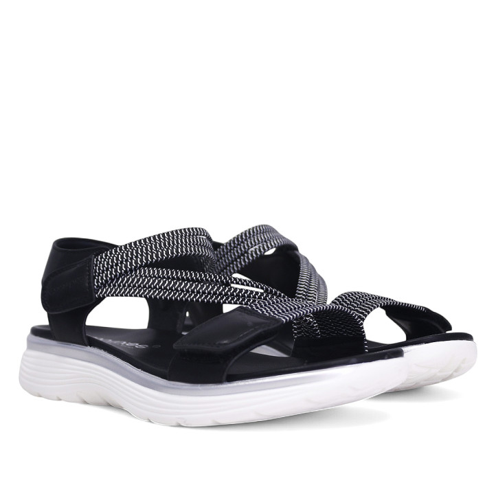 Sandalias planas Amarpies negras con detalles blancos, tira elástica central y cierre de velcro - Querol online