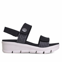 Sandàlies falca Amarpies negres amb detalls blancs, tancament amb velcro i detall platejat - Querol online