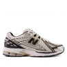 Sabatilles esportives New Balance 1906R metallic silver con metallic gold home