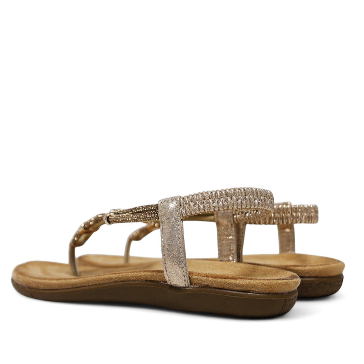Sandalias planas doradas con anillos brillantes y elástico en el tobillo - Querol online