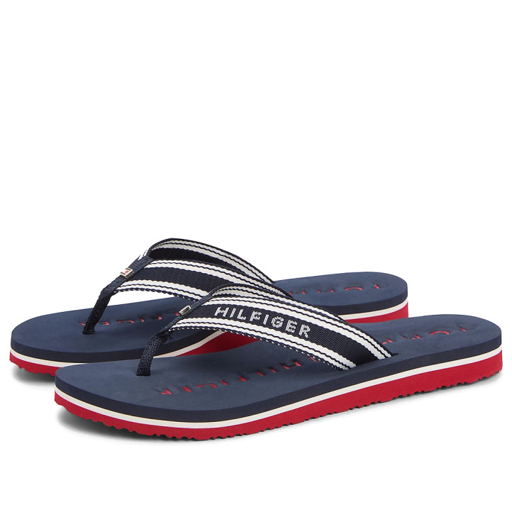 Xancles Tommy Hilfiger blaves amb tires textil trenades i broda blanca - Querol online