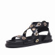 Sandalias planas BB Up negras con tiras cruzadas y tachuelas redondas doradas - Querol online