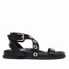 Sandalias planas BB Up negras con tiras cruzadas y tachuelas redondas doradas