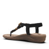 Sandalias planas Amarpies negras con apliques de madera redondos y en forma de flor