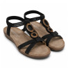 Sandalias planas Amarpies negras con doble aplique de madera y pulsera elástica