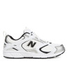 Sabatilles esportives New Balance 408 blanques i platejades amb detalls negres
