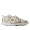 Sabatilles esportives New Balance 408 de dona daurades metal·litzades