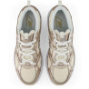 Sabatilles esportives New Balance 408 de dona daurades metal·litzades