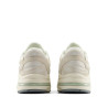Sabatilles esportives New Balance 1000 beix amb detalls per a dona