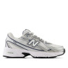 Sabatilles esportives New Balance 740 unisex blanques i platejades amb detalls blau marí