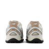 Sabatilles esportives New Balance 204L blanques i platejades amb detalls beix per a dona