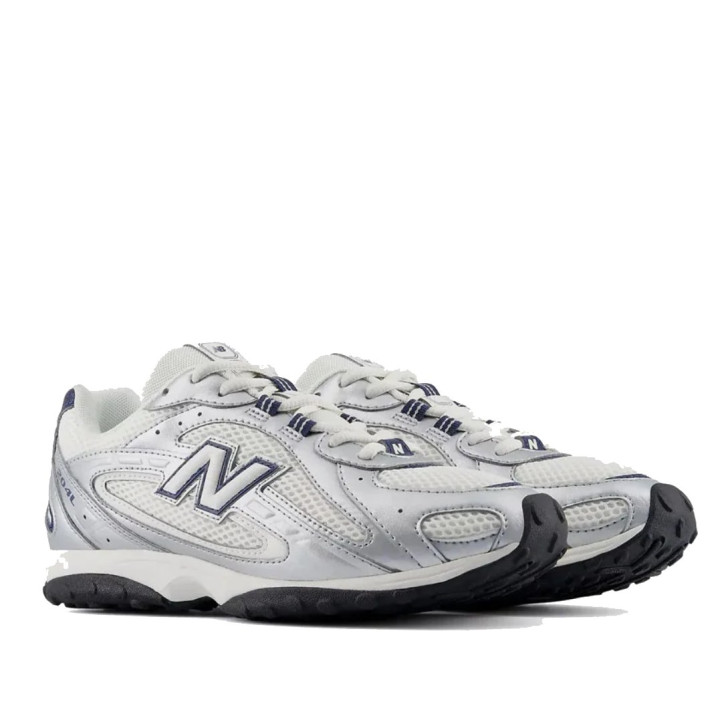 Sabatilles esportives New Balance 204L blanques i platejades amb detalls blau marí per a dona - Querol online