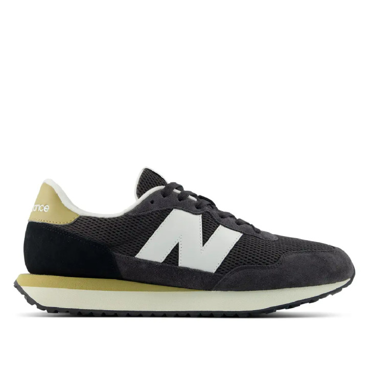 Sabatilles esportives New Balance 237 d'home negres amb detalls blancs i daurats - Querol online