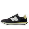Sabatilles esportives New Balance 237 d'home negres amb detalls blancs i daurats