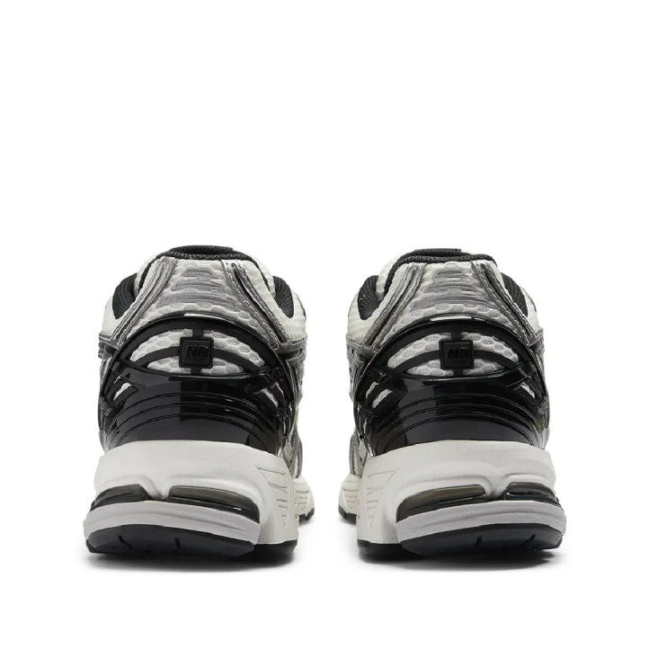 Sabatilles esportives New Balance 1906R d'home blanques i platejades amb amortiment ABZORB SBS - Querol online