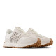 Sabatilles esportives New Balance 327 de dona beix amb logotip animal print i sola color caramel - Querol online