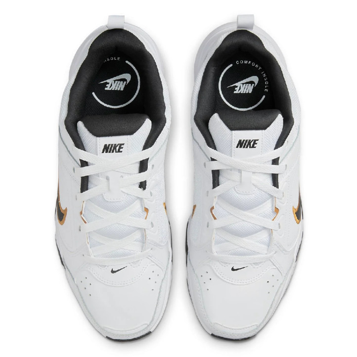 Sabatilles esportives Nike Defy All Day d'home blanques amb detalls negres i daurats - Querol online
