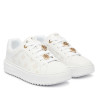 Sabatilles GUESS de dona blanques amb plataforma i detalls daurats