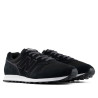 Sabatilles esportives New Balance 373 unisex negres amb detalls gris fosc