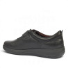 Zapatos planos Treintas en piel negra con cierre de velcro y elásticos decorativos
