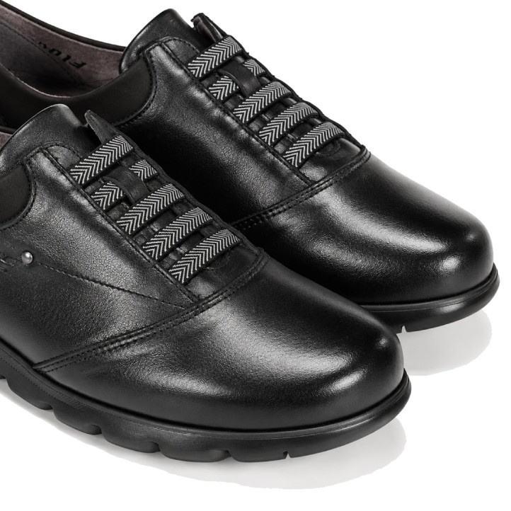 Zapatos planos Fluchos Susan de mujer negros de piel con cordones elásticos - Querol online