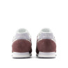 Sabatilles New Balance 373 de dona bordeus de camussa i malla amb detalls blancs
