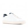 Sabates sport CLAE blanques amb part posterior blava
